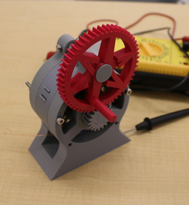 NextSpark: Assembled printed generator on the bench, output checked with a multimeter